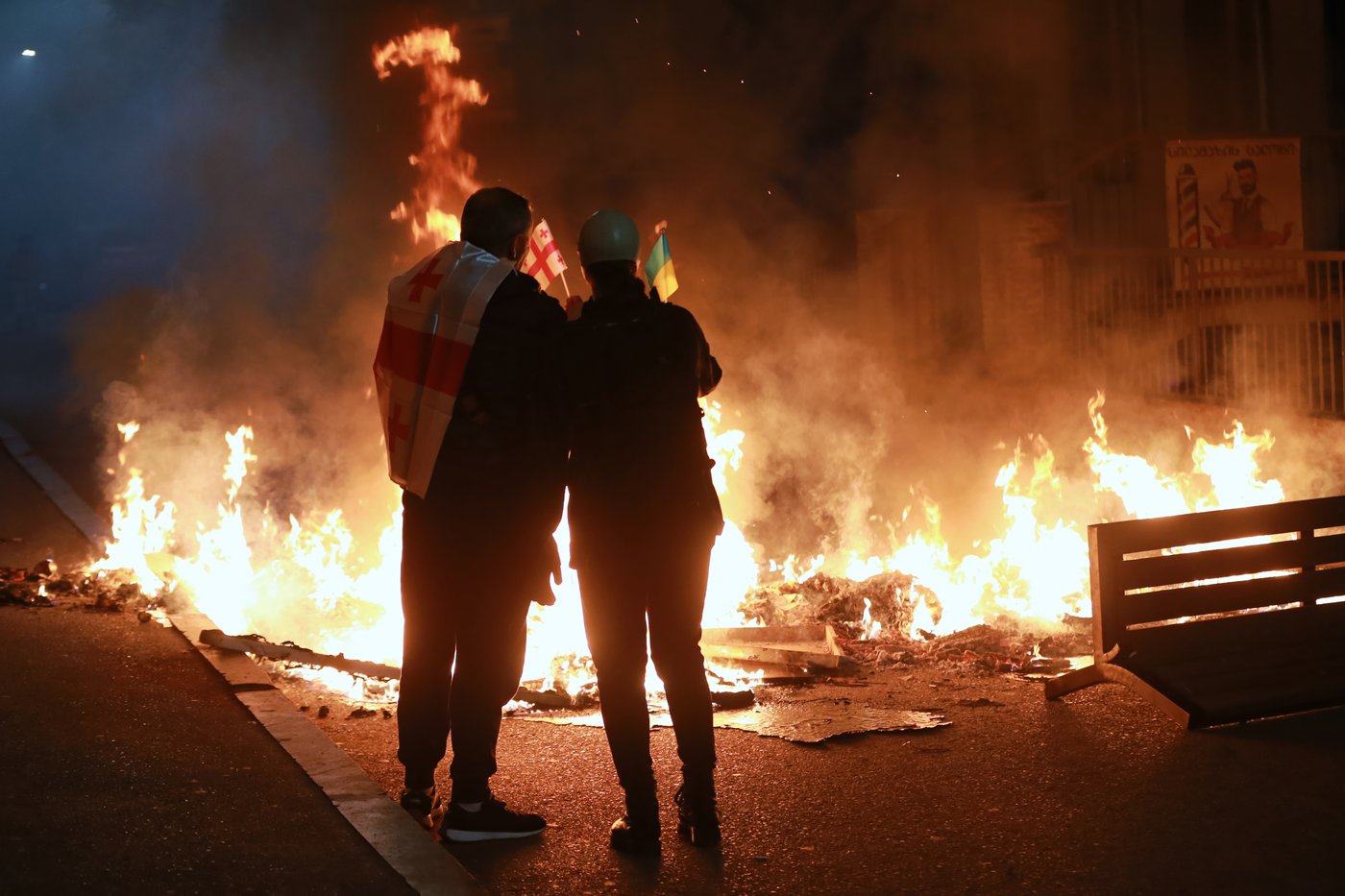 Georgia launches sweeping crackdown on dissent as opposition blocs boycott local election, in photos