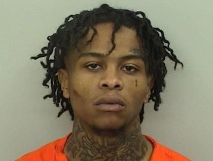 22-year-old man charged with abusing girlfriend in front of their child