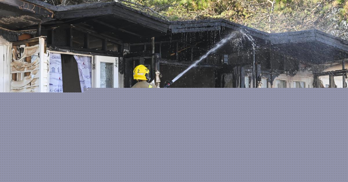 PICTURES: Raging fire tears through beach huts and triggers major emergency response