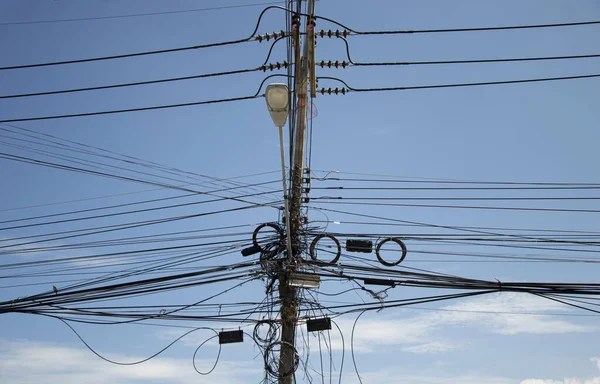 Utility companies given 6 weeks to clear hanging wire bundles from poles