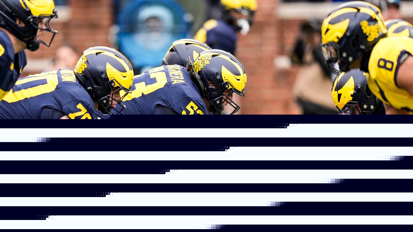 Michigan football offensive line taking shape as two starters emerge early in fall camp