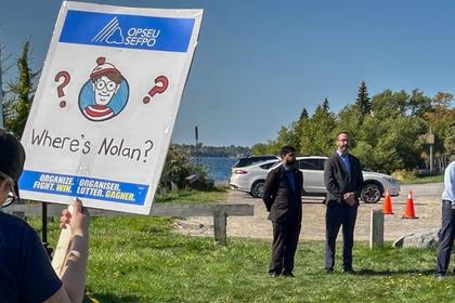 Ontario Minister Quinn Confronted by College Strikers