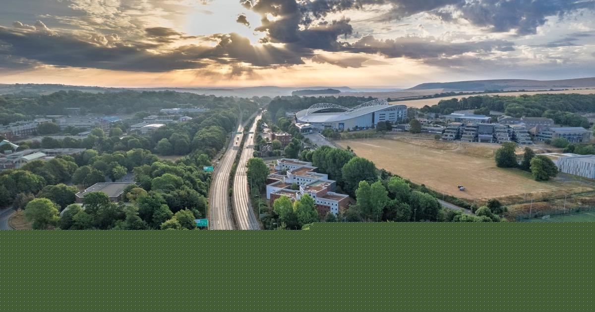 Sweeping countryside and city views captured under dramatic skies
